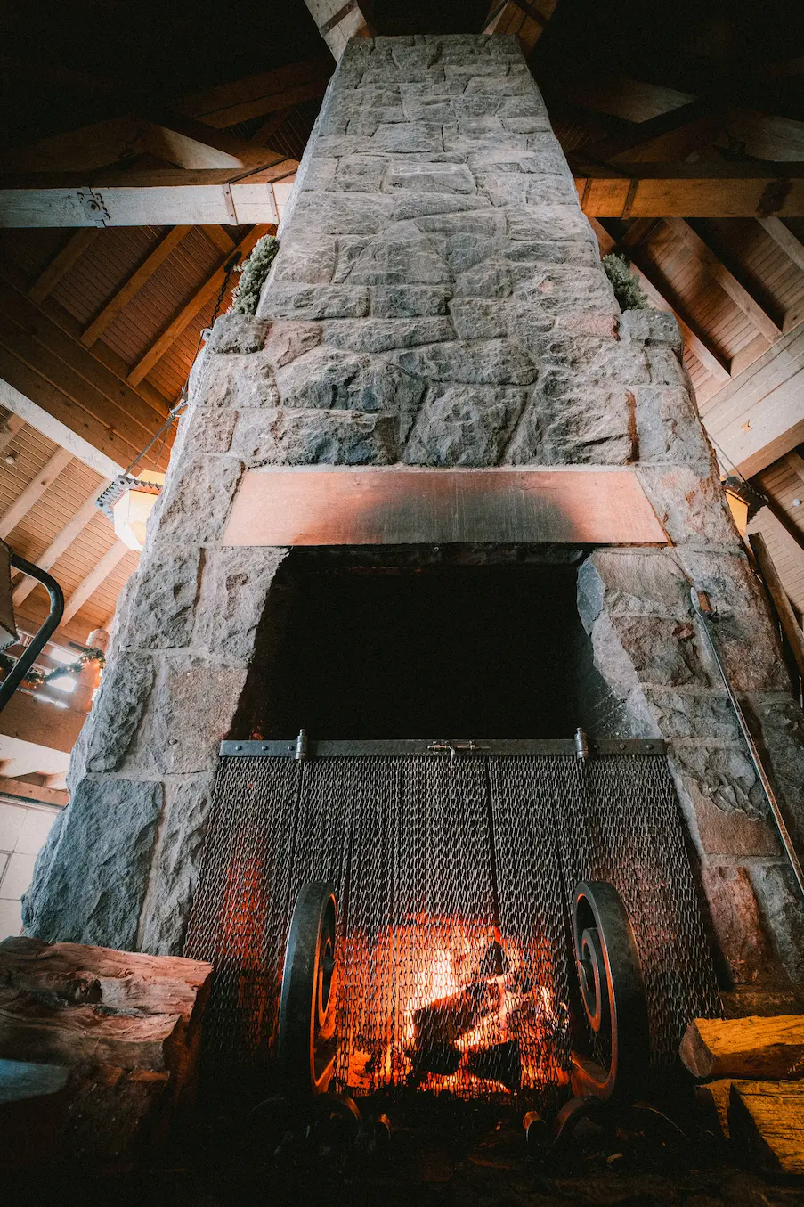 A large fireplace inside Timberline Lodge