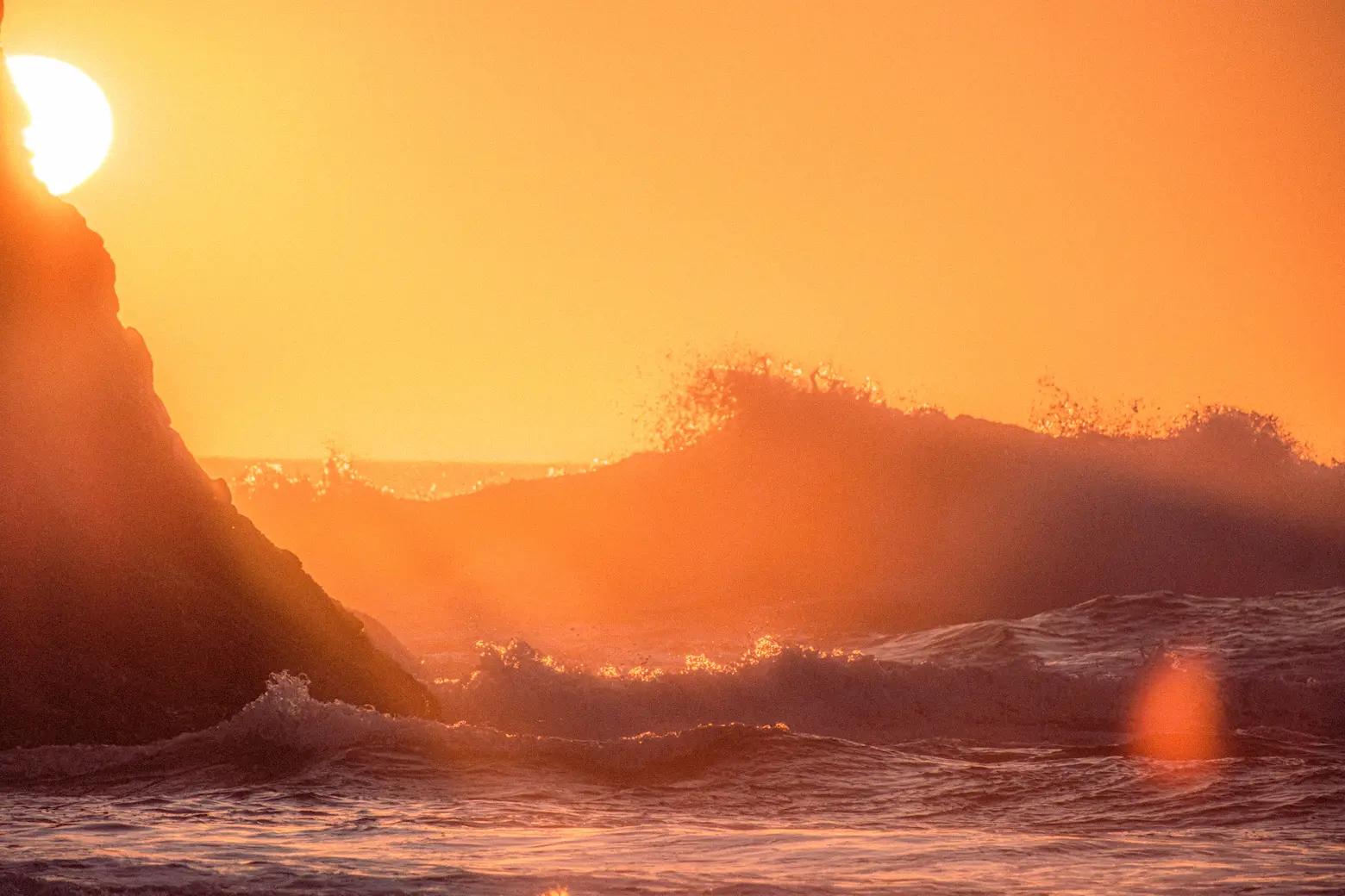 Waves on the ocean at sunset